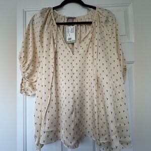 Women's H&M Blouse Size XL. Cream with Black details all over the shirt.